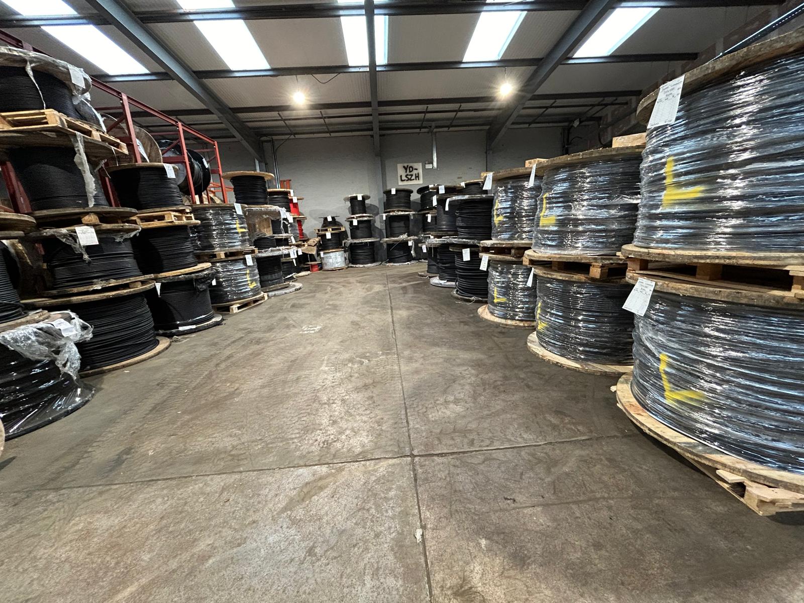 Deep aisle of cable reels ready for collection at Clyde Cable